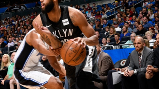 Nets pull away in fourth to beat Magic 111-104