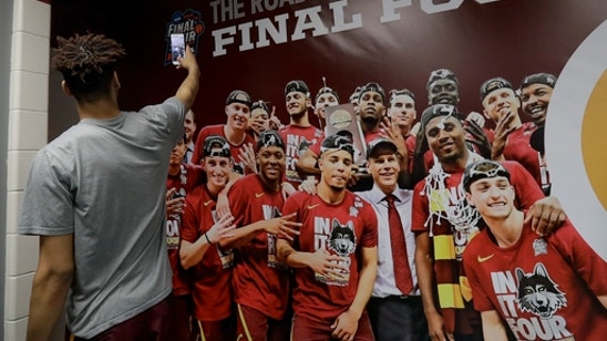 Red carpets, loud socks: Teams arrive for festive Final Four