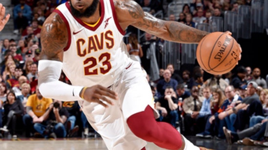 Clipping? LeBron takes on Alabama football over barber show