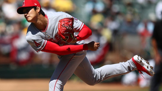 Ohtani wins pitching debut, leads Angels over A’s 7-4