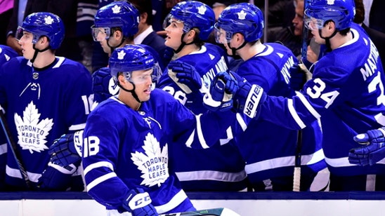 Maple Leafs beat Sabres 5-2, tie franchise mark for points