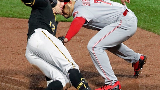 Moran and Marte lead streaking Pirates over Reds 14-3