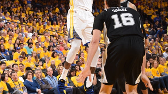 Durant, defending champ Warriors get defensive, beat Spurs