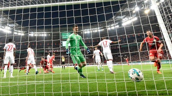 Bayern reaches German Cup final with 6-2 win in Leverkusen