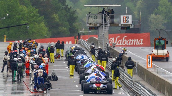 The Latest: IndyCar race quickly back under red flag