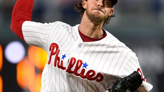 Herrera hits 2 homers, Nola goes 7, Phils beat Braves 7-3