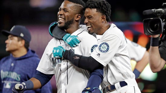 Heredia’s RBI single in 11th lifts Mariners past Rangers 9-8