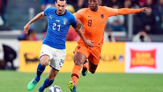 Netherlands score late to draw with Italy 1-1 in Turin