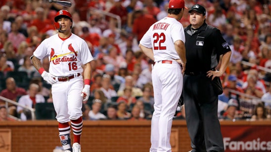 Urena gets 1st win as Marlins snap skid, beat Cards 7-4