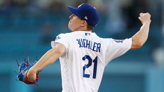Dodgers’ Buehler pulled after visit from team trainer