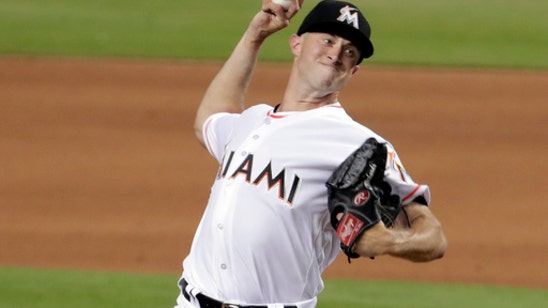 Richards earns first win, Marlins beat Giants 3-1