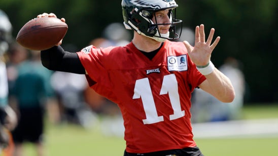 Wentz eager to return, but Foles allows Eagles to wait