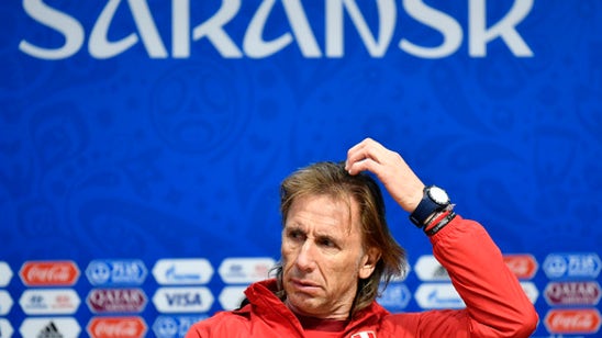 The Latest: No guarantees Guerrero will start for Peru