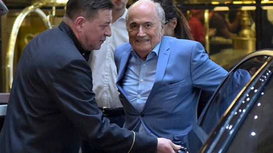 The Latest: Ex-FIFA President Blatter meets Putin at Kremlin