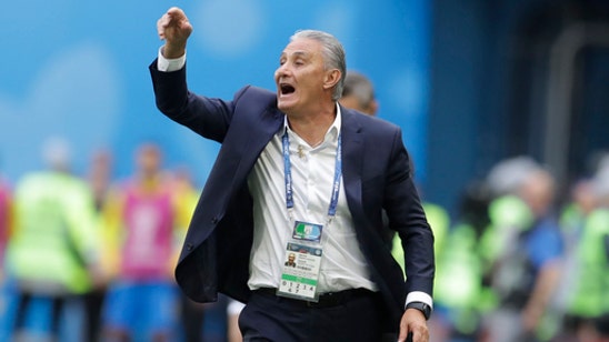 Tite takes a tumble celebrating Brazil goal at World Cup