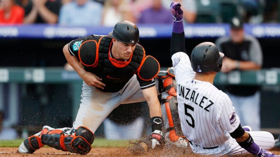 Gray strikes out 12 in Rockies’ 11-3 win over Marlins