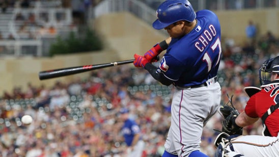 Minor pitches Rangers past Twins for 6th straight win