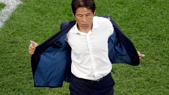 Honda goal gives Japan a 2-2 draw with Senegal at World Cup