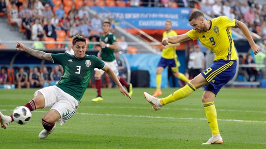 Sweden blanks Mexico 3-0, but both head to knockout round