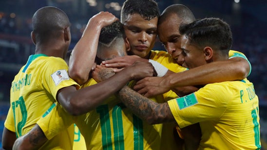 Brazil advances to round of 16 at World Cup, tops Serbia 2-0