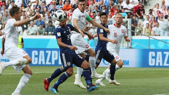 Japan advances on yellow cards despite losing at World Cup