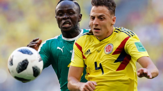AP PHOTOS: Yellow-card tiebreaker on Day 15, a World Cup 1st