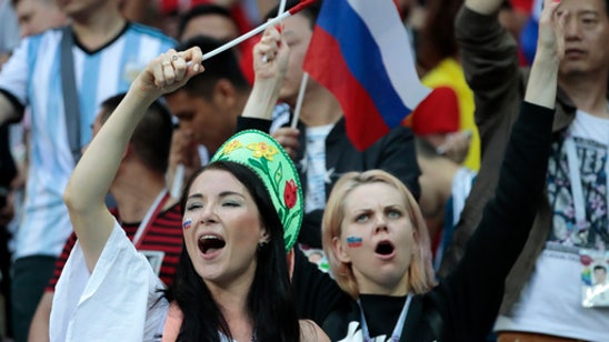 Russia win in World Cup offers distraction as Putin benefits