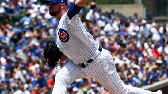 Jon Lester stars on bound and at plate for Cubs