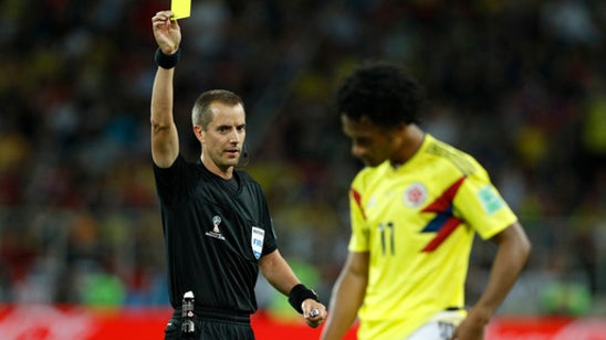 The Latest: US ref Geiger retained for rest of World Cup