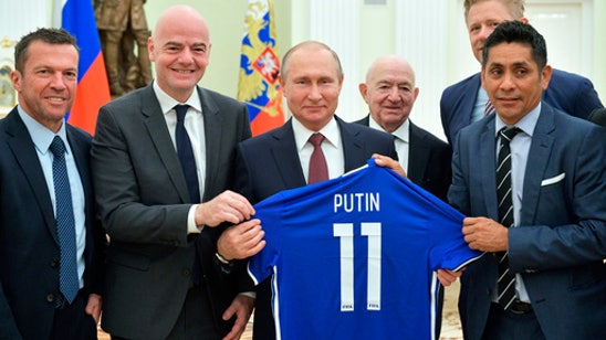 Column: Infantino fawns over Putin, politicizes soccer body