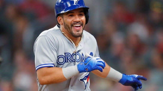 Albies hits 2 HRs, drives in 4, as Braves top Blue Jays 9-5