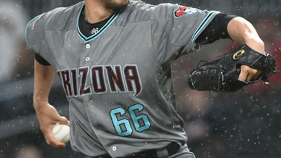 Ahmed breaks tie in 7th as Diamondbacks top Braves 2-1