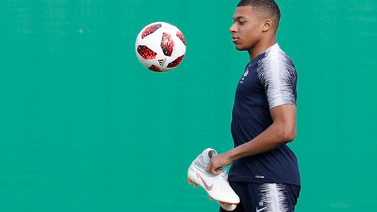 From young Mbappe to aging keeper, the World Cup in records