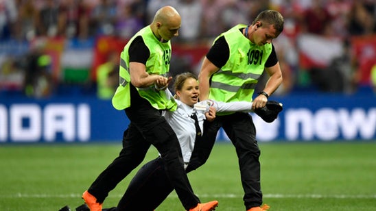 Pussy Riot upstages Putin with protest that halts World Cup