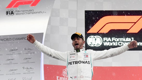 Resilient F1 champion Lewis Hamilton revels in adversity