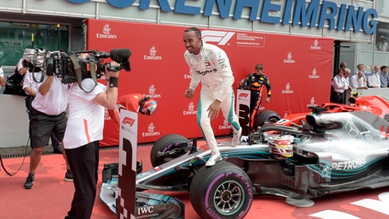 Despite taking F1 lead, Hamilton says Ferrari has upper hand