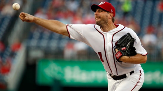Scherzer fans 10, Nationals cruise to 10-4 win over Reds