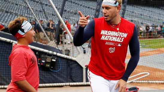 Having a catch: Astros, Nats kids crash World Series warmups