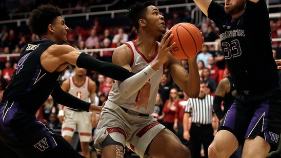 Nowell, No. 25 Washington hold off Stanford 62-61