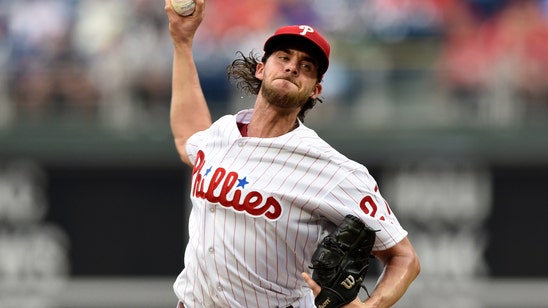 Nola strikes out 11, pitches Phillies past Mets 4-2