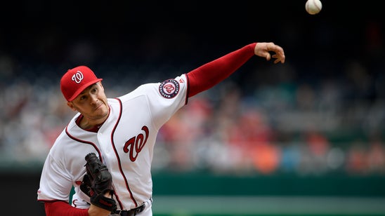 Corbin earns 1st win with Nationals, beats Giants 4-2