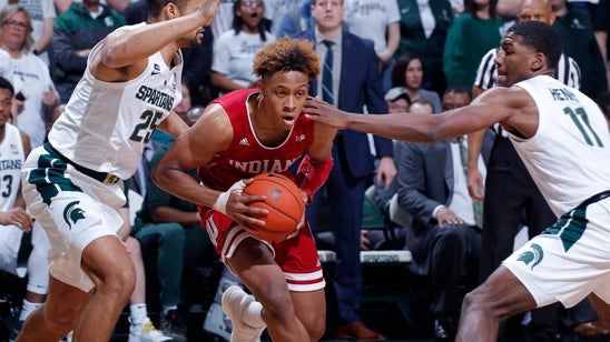 Langford helps Indiana down No. 6 Michigan State 79-75 in OT