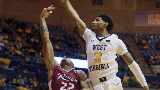 Strong second half lifts WVU over Rider 92-78