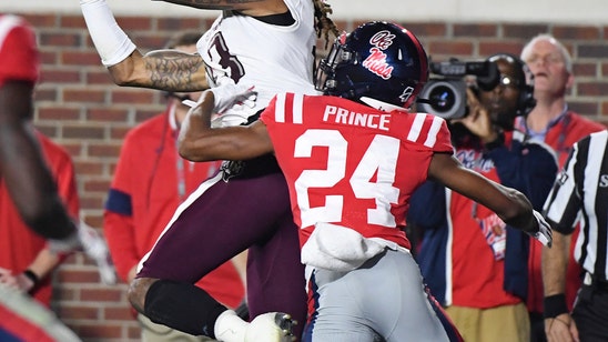 Fumble recovery, late TD helps Texas A&M beat Ole Miss 24-17
