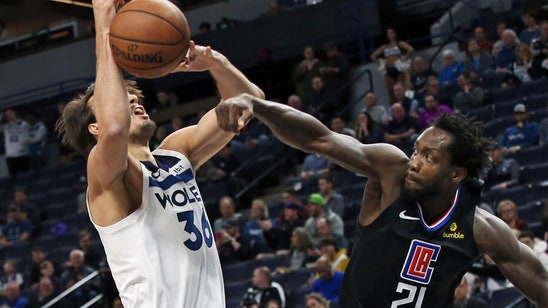 Clippers clinch playoff spot with win over Timberwolves