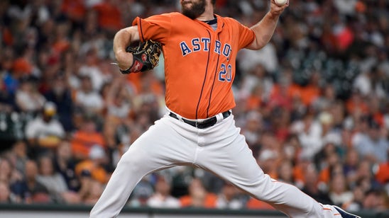 Miley solid, Astros hit 6 homers to rout Mariners 10-2
