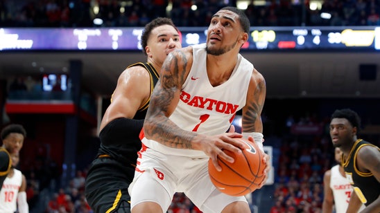 Hobbled Toppin carries No. 13 Dayton past VCU, 79-65