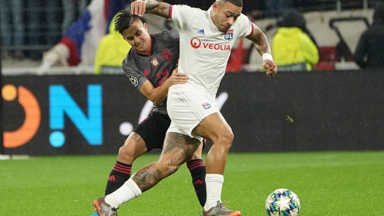 Lyon beats Benfica 3-1 in Champions League