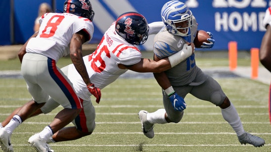 Taylor's running, Huff's safety help Memphis beat Ole Miss