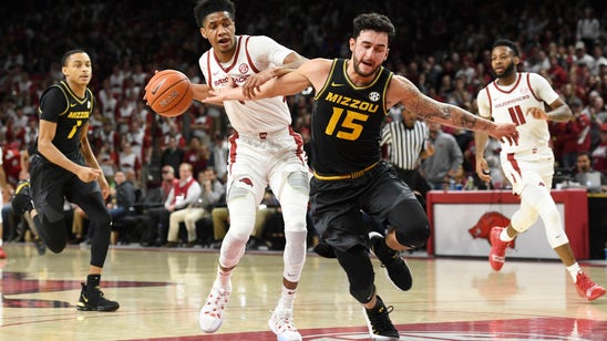 Arkansas ends 4-game skid, rallies past Missouri 72-60,